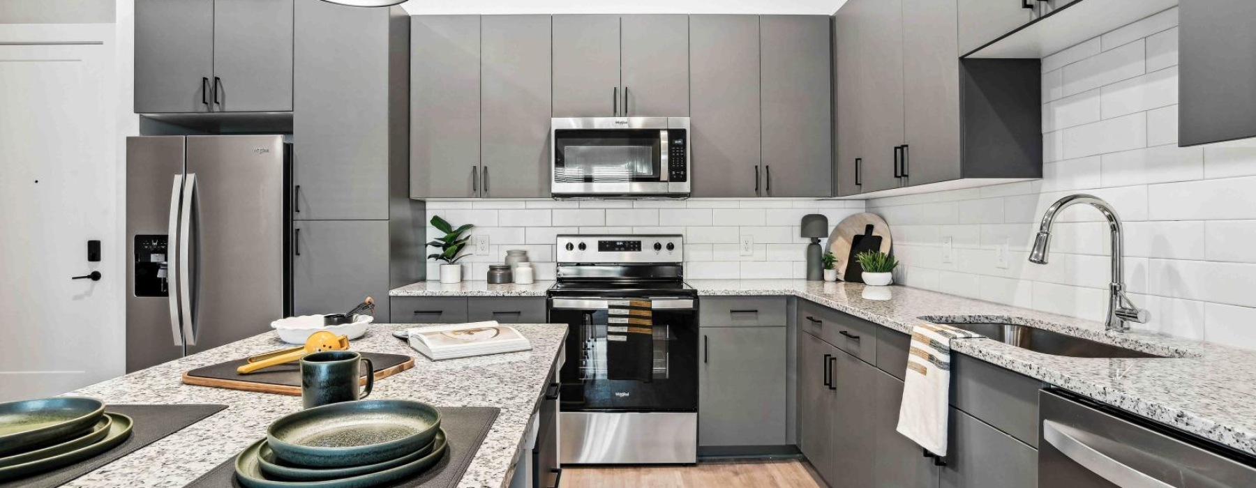 a kitchen with stainless steel appliances